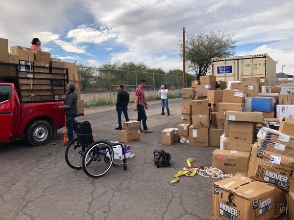 Volunteers loading free medical supplies Tucson.