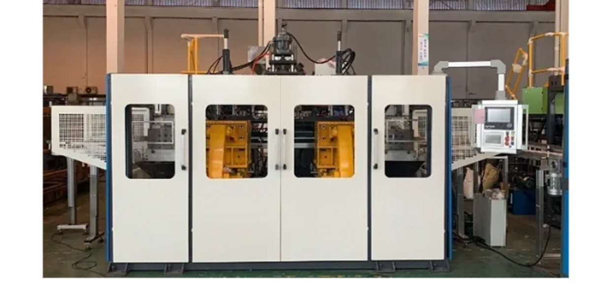 Industrial machine with control panel in a factory setting.