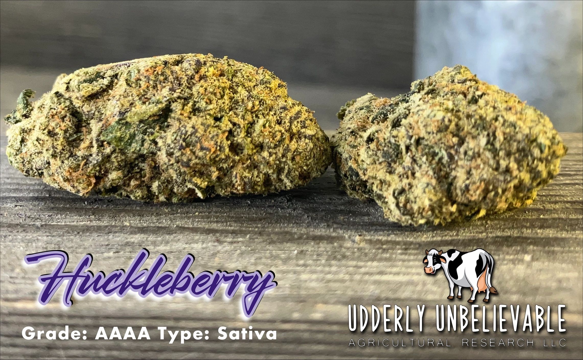 Close-up of two cannabis buds labeled Huckleberry, Sativa grade AAAA.