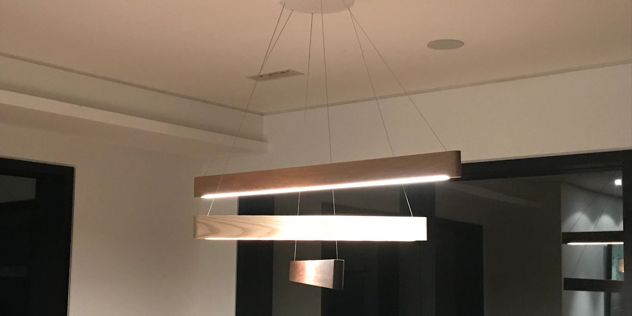 Custom Modern Light Fixture hung by Pine Ridge Electric 