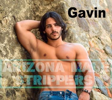 Arizona male stripper. Name Gavin. Medium tone male, dark long hair. Thick muscle tone. Facial hair