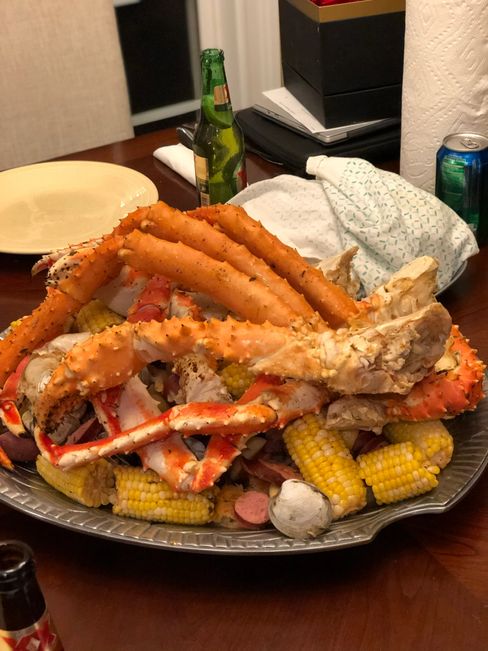 The Best Seafood Boil Ever!  Delicious Alaskan king crab legs, shrimp, little neck clams, lemons, po