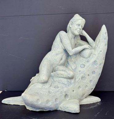 "Moon Shadow" Figure in terracotta with  faint blue/gray finish.

Artist: Dana McCullough