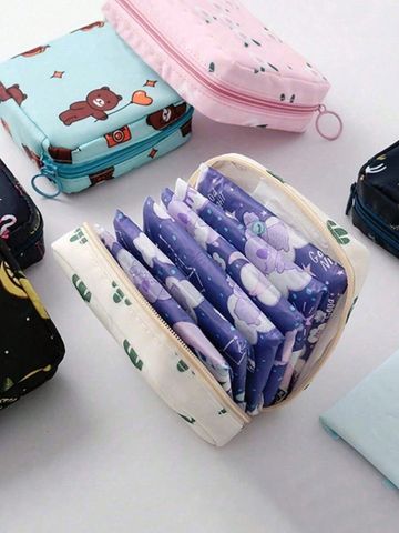 Colorful pouch organizers with cartoon prints.
