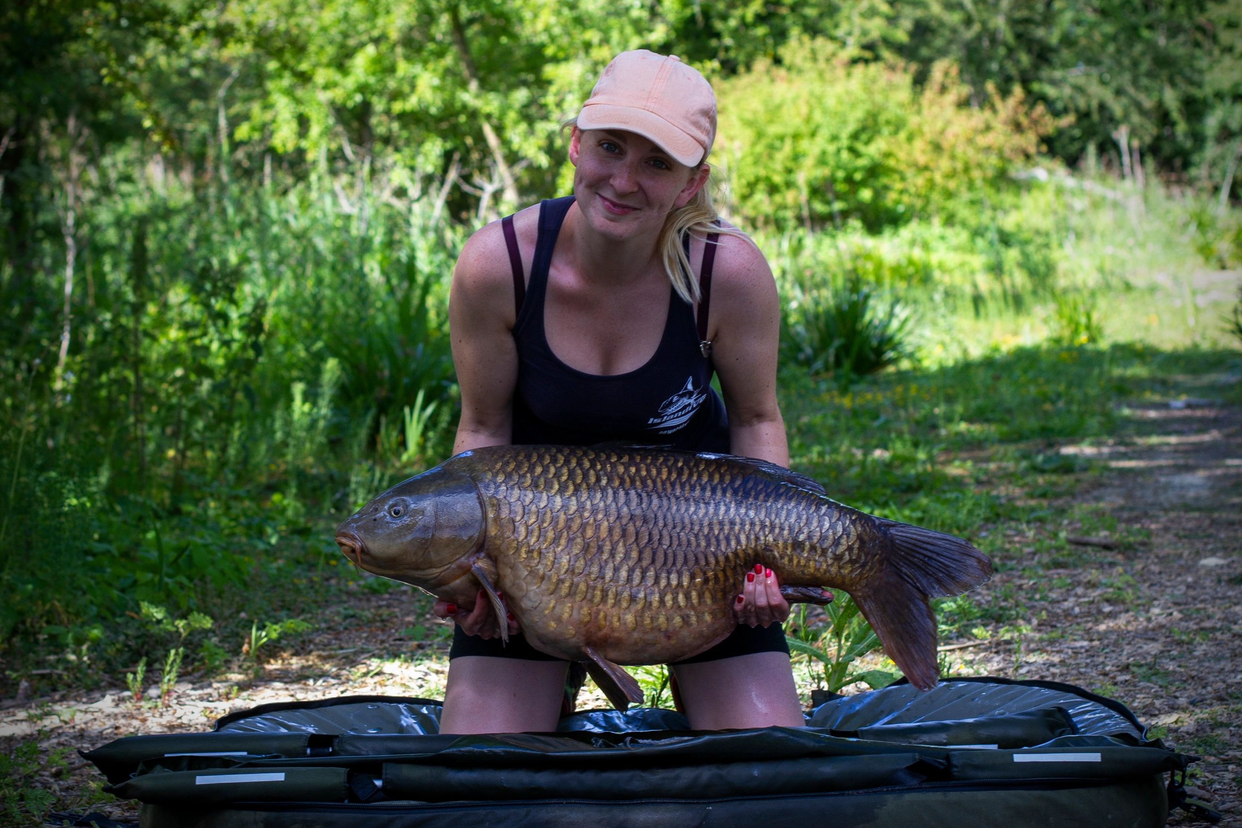 Harriet Treadwell with a Nash Royston Common carp @ 32lb 8oz Co-founder of ClubCarp 