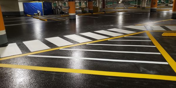 Striping, power washing, paint removal,parking lot layout, custom stenciling in Surrey BC
