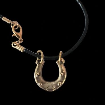 Handmade bronze horseshoe charm on black cord necklace with gold colour clasp, lucky horseshoe 