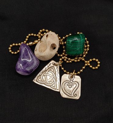 Handmade witches heart & triqeutra charm necklace.
Brass & jeweller's bronze.
Available on Etsy 