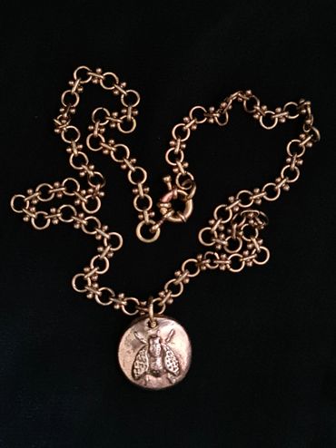 Antique inspired handmade fly / insect pendant necklace.
Brass & bronze. 
Available on Etsy 