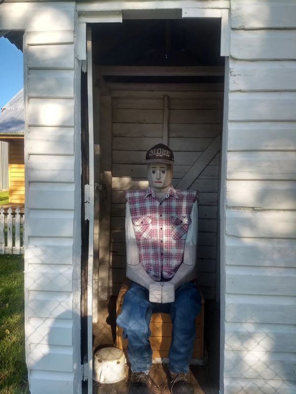 The man on the "Thunderbox", Gilandra's answer to the Dog on the Tuckerbox.