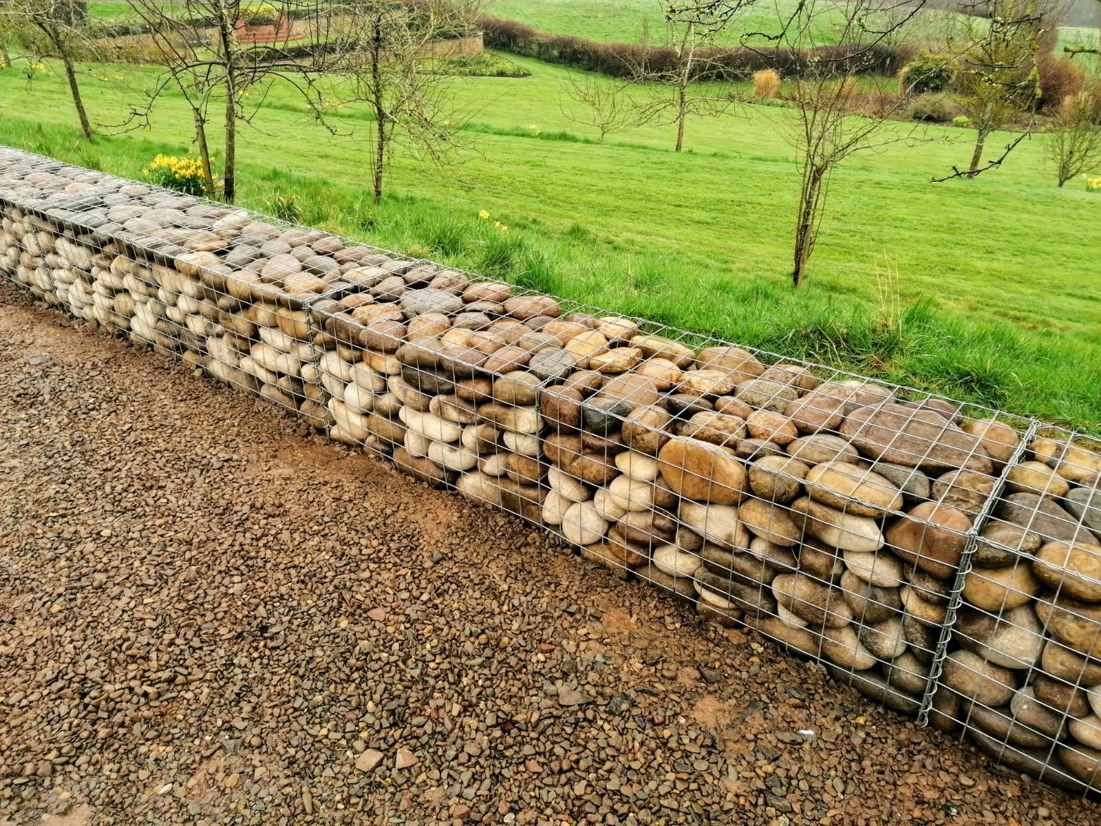 traditional property in rural Shropshire wall built with gabions. Alternative walls in brick or ston