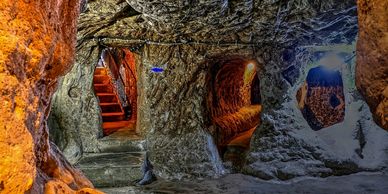 Cappadocia underground city tunnel with stone walls, ancient chambers, and historical passageways