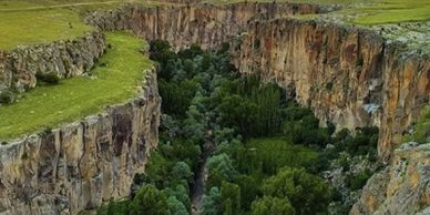 Ihlara Canyon view on Cappadocia Green Tour with lush valley, walking trail, and river scenery