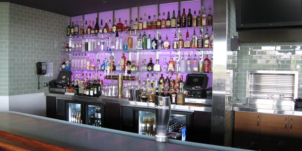 Design of a bar with alcoholic drinks and counter