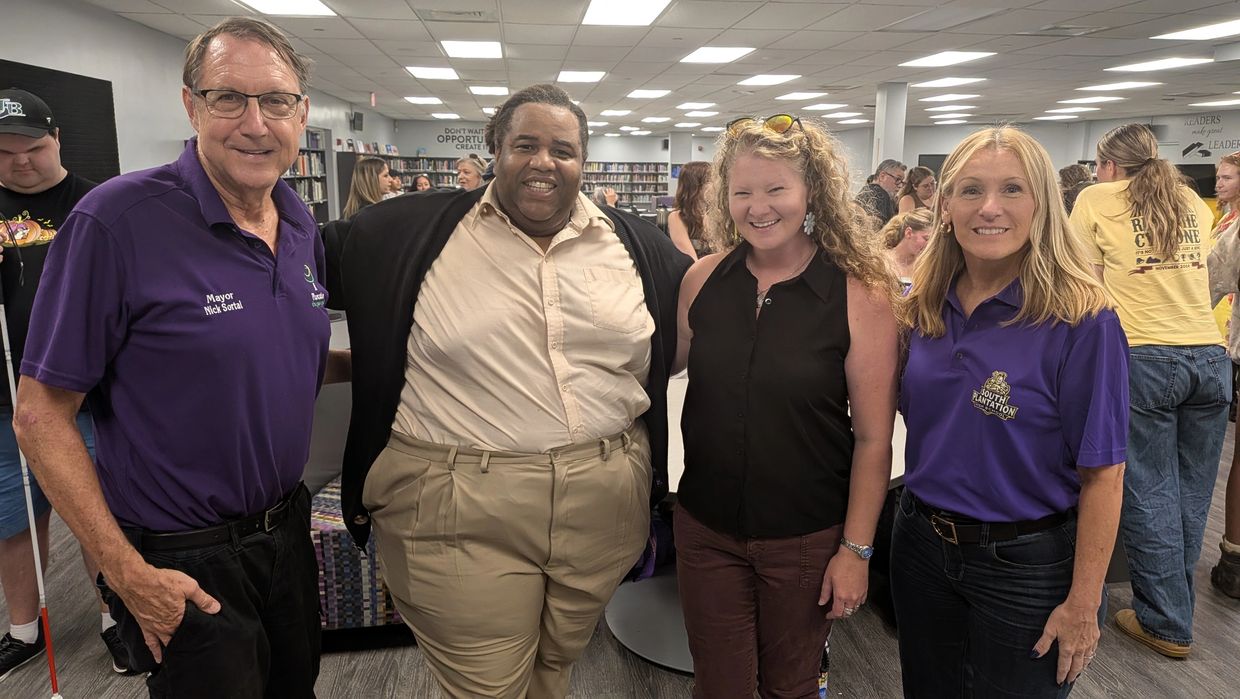 L-R: Mayor Nick Sortal, new choir director Alphonso Walker, new theater director Shannon Ouelette an