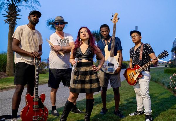 Led by the dynamic powerhouse, Vanessa Rodriguez, a classically trained vocalist and fearless perfor