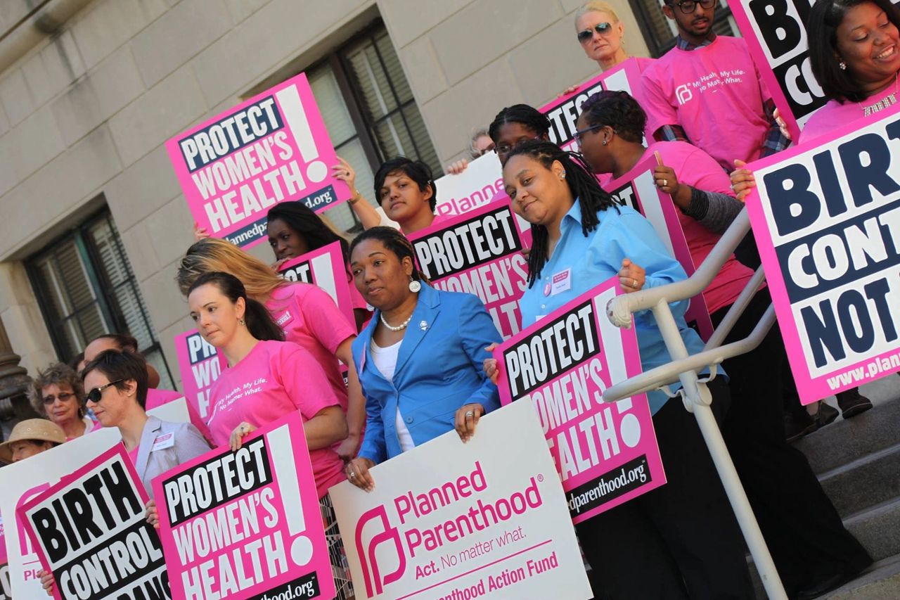 On the steps of the New Jersey State House demanding funding for Planned Parenthood