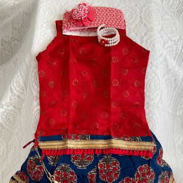 Beautiful red golden floral zari print sleeveless top with blue skirt (ghagra) on premium quality co
