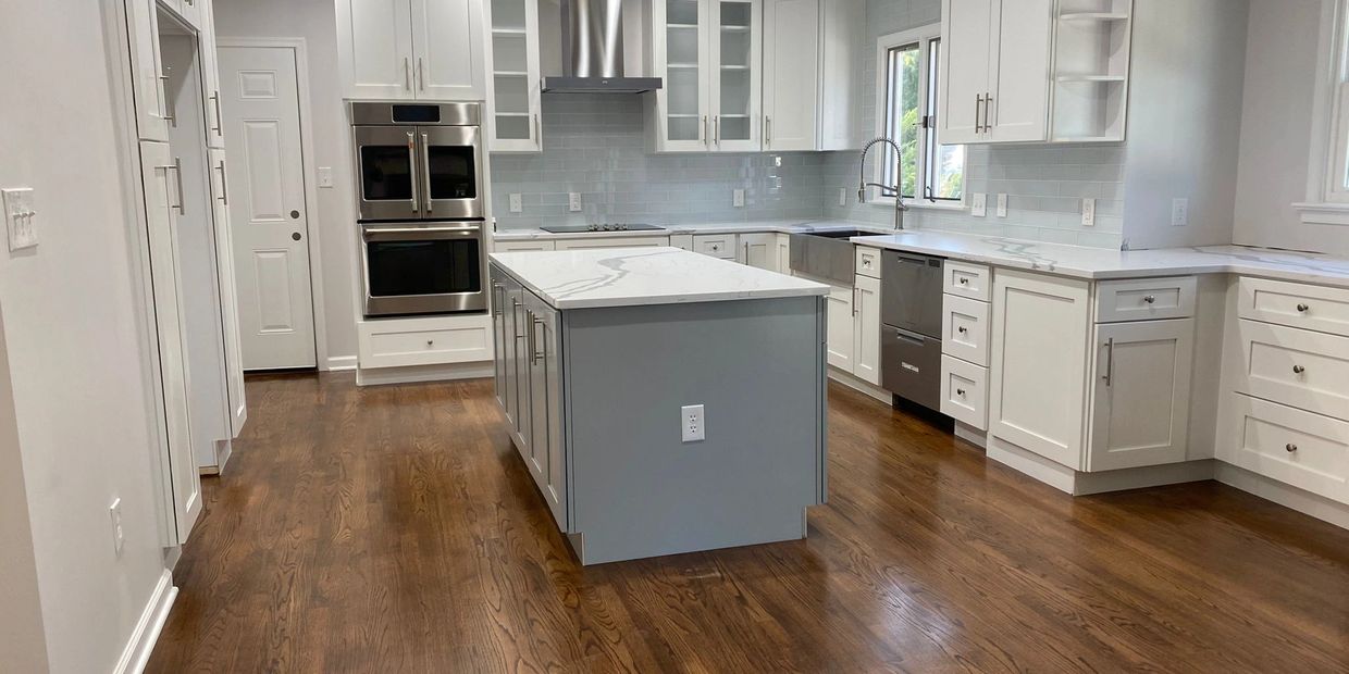Complete kitchen remodeling service by GPI featuring custom cabinets, new flooring, and upgraded 