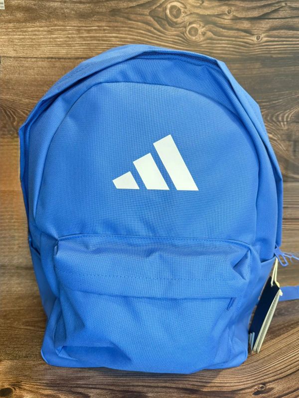 Blue Adidas backpack with white logo.