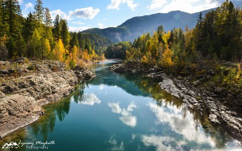 Montana Mountains, near a river with rocky shore line. Photographer Lynsay Maykuth.