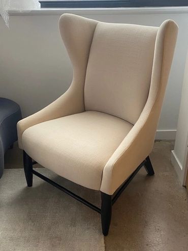 West Elm Creme Fabric Wing Back Chair: $175
