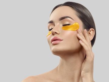 woman with gold gel eye masks on 