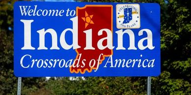 Welcome sign for Indiana, the Crossroads of America.