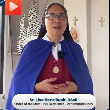 Sr. Lisa Marie Dupit in religious attire speaking indoors.