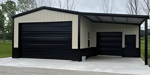 A modern black and cream garage with two large doors under a cloudy sky.