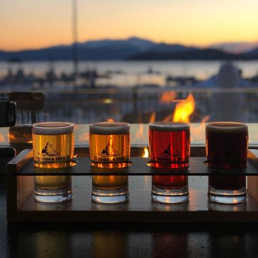 Tasters on patio with fireplace