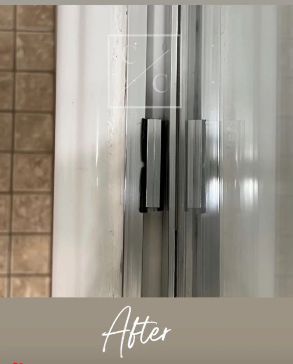 Close-up of a clean sliding door track after cleaning.