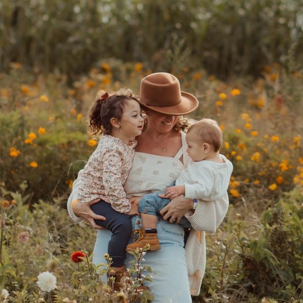 Jennie and her two babies in a field of wildflowers in Southold, NY.