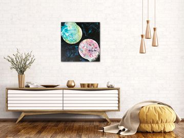 Galaxy inspired artwork displayed in a modern livingroom.