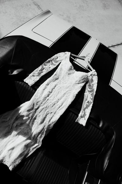 Wedding gown displayed on the back of a vehicle