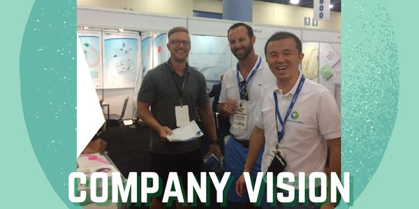 company vision, has three scientist and experts smiling at convention