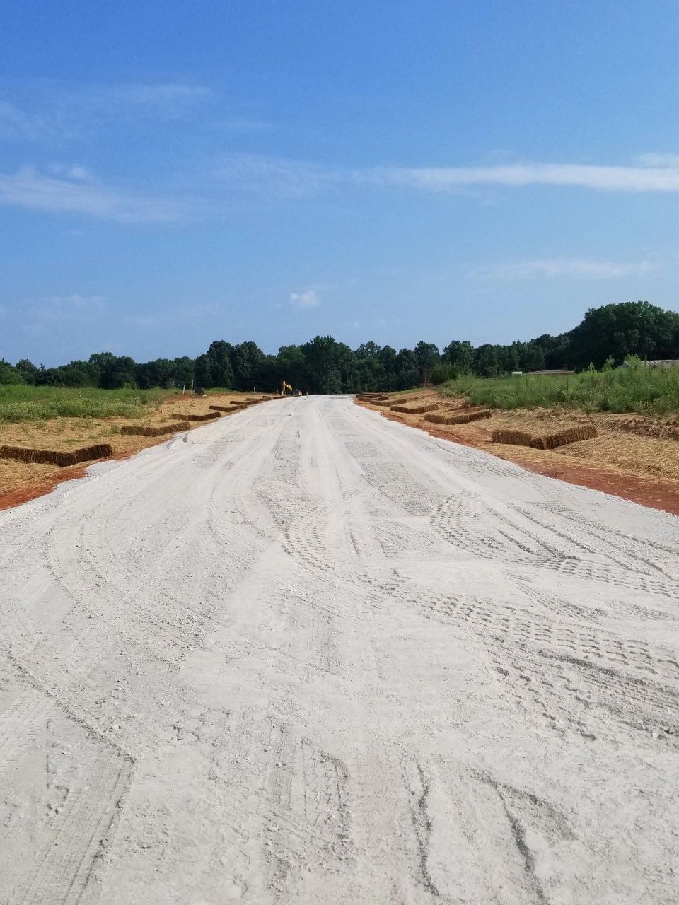 Contracting before bringing in the pavement