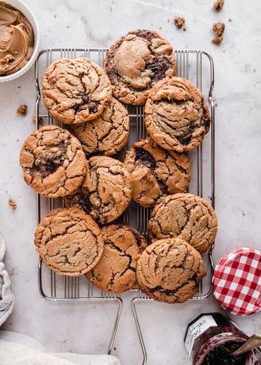 peanut butter and jelly cookies on cooling rack made by Chicago Food Stylist Nicole Triebe