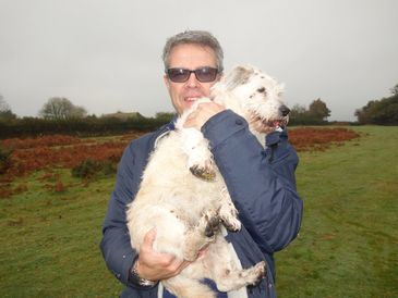 Choughed Online Art founder and owner Paul Cowling with Lottie the dog!