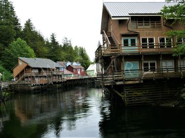 Houses line the river in coastal Alaska