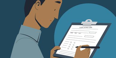 Person filling out a client intake form on a clipboard.