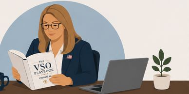 Woman reading the VSO Playbook at her desk with a laptop and plant.
