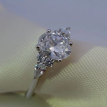 14K White Gold Oval Diamond Engagement Ring with Pear and Round Accents