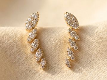 14k yellow gold dias leaf drop earrings with pavé set marquise leaf motifs and round brilliant dias