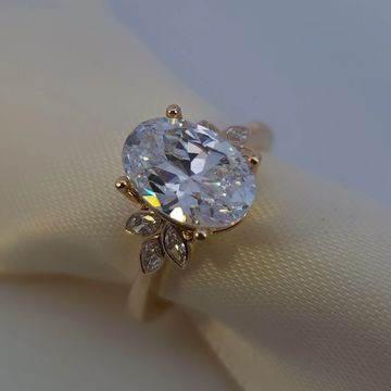 14K Yellow Gold Oval-Cut Diamond Engagement Ring with Marquise Side Stones