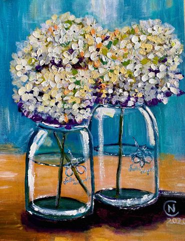white and purple Hydrangeas in glass jars painted in acrylic paint.