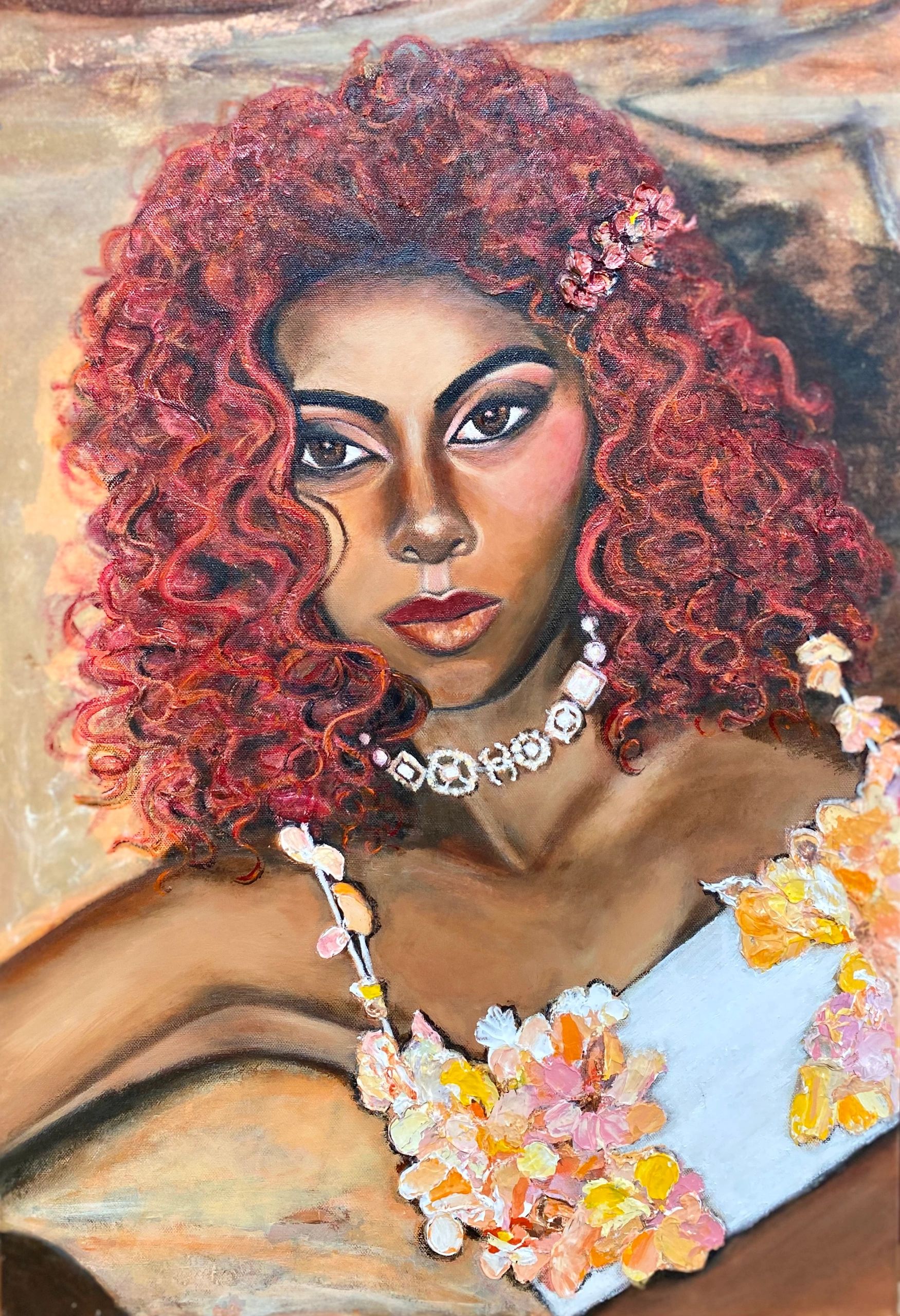 Portrait of a female with red hair and flower top.