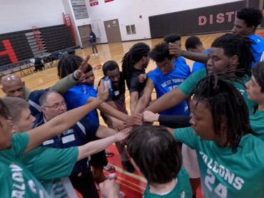 Truman Middle College battling a tough West Town basketball team during the CAAEL League Playoffs. 