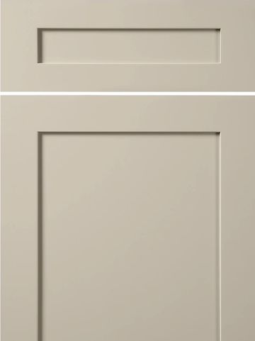 Close-up of beige cabinet doors with recessed panel design.