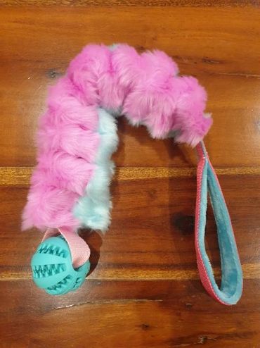 faux fur handle with bungee and tooth brush ball